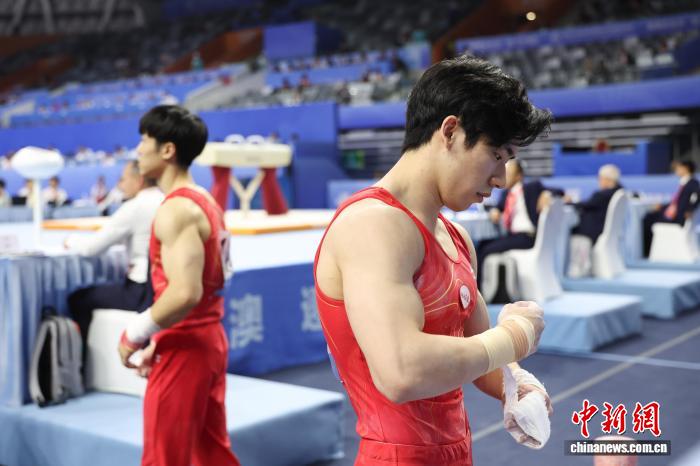 张博恒十五运会单杠夺冠背后的责任与坚持